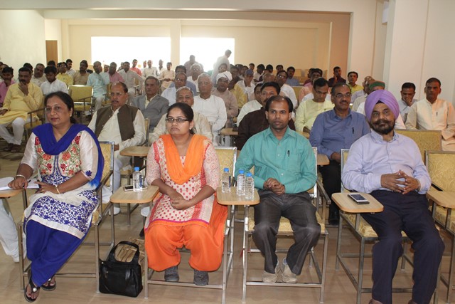 Bank Manager and Bank staff in audience.